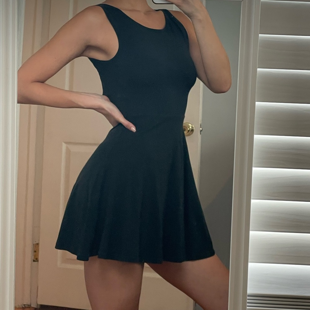Mini black dress with open back